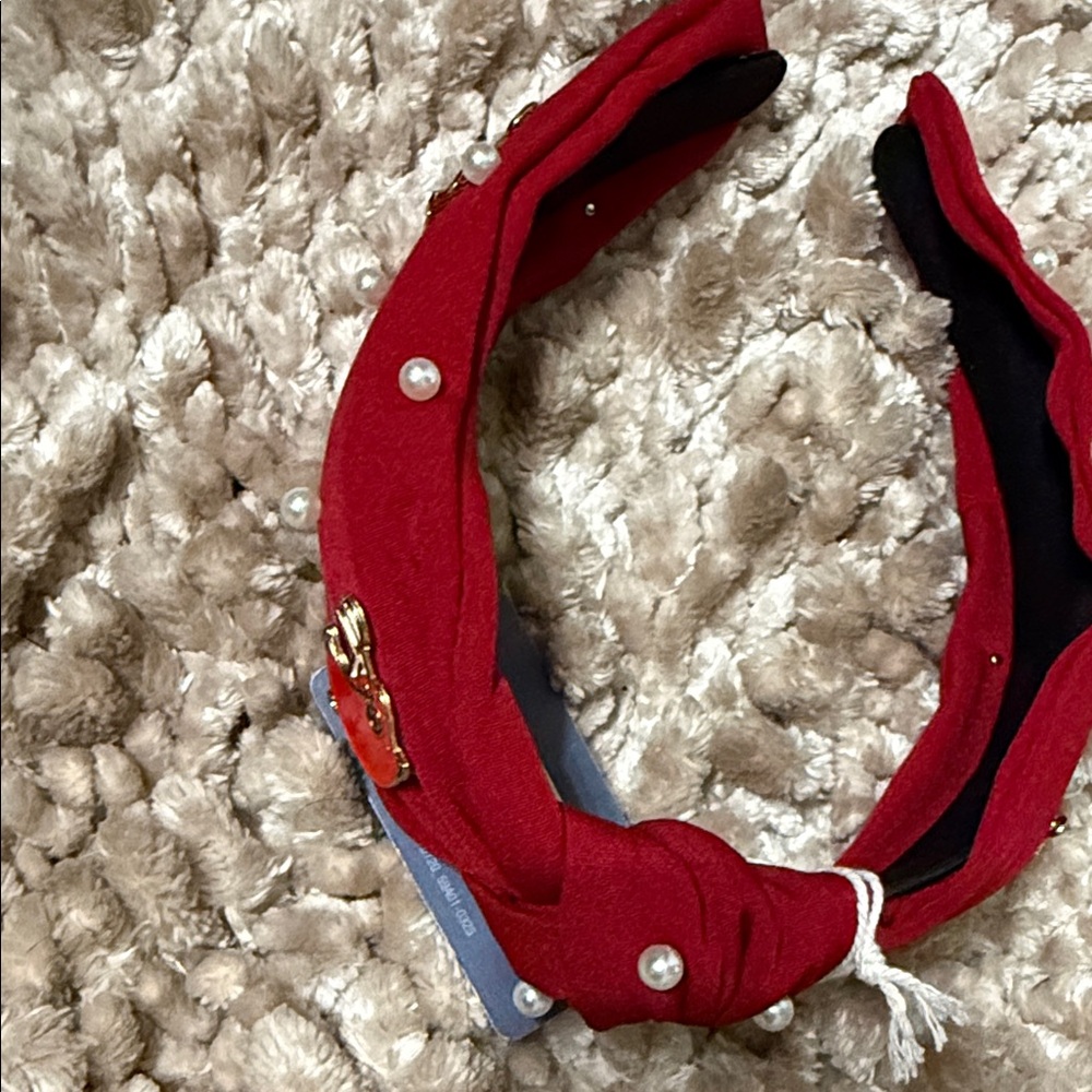 Red Jacket with Pearl Accents and Apple Pin